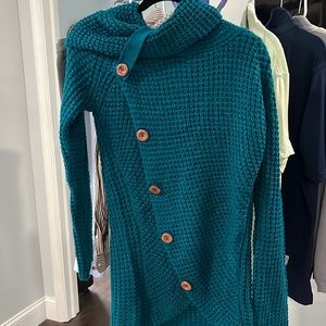 Women’s turquoise long wrap style button cardigan. Never worn, no tags size M